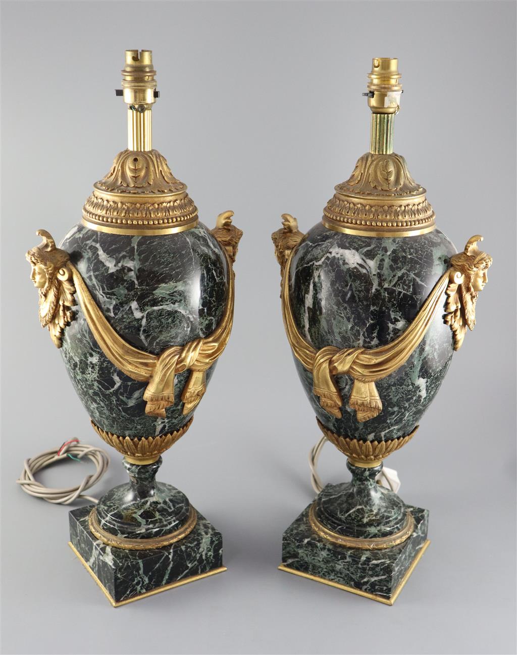 A pair of early 20th century ormolu green marble table lamps, overall height 20in.